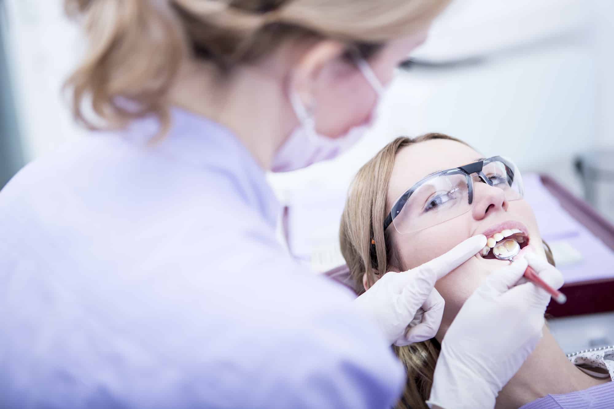 Hardening of dental filling at the dentist